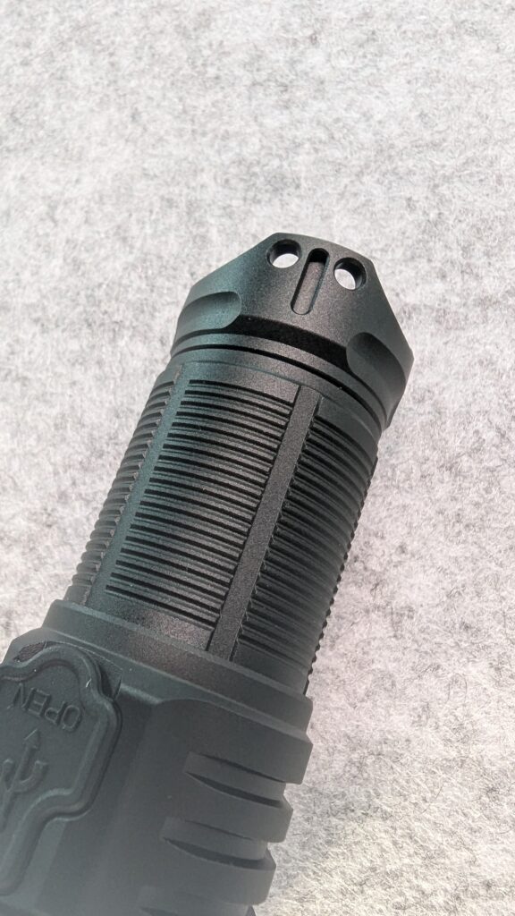 Schafft plus Ende der Taschenlampe